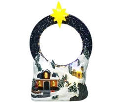 Scenka LED wioska w górach, sanie z Mikołajem w kole 28cm