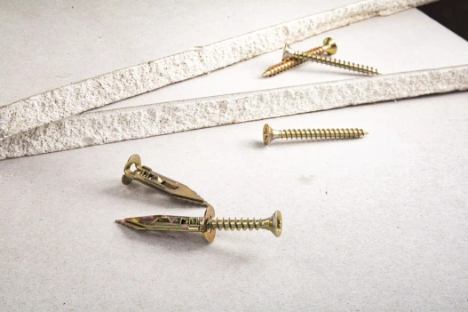 Łącznik metalowy 10,5x30 mm do wbijania do płyt G-K z wkrętem 4x40 mm 25szt